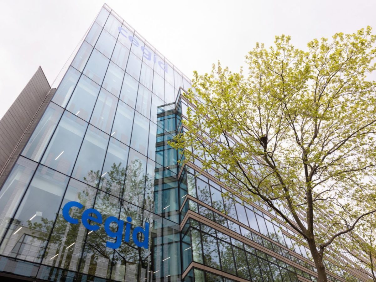 Cegid Silae Merger coverage showing the real Cegid headquarters in Lyon with its name on the glass facade.