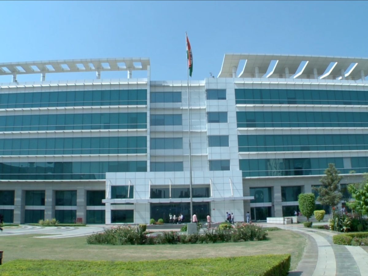 HCLTech Pulse represented by a licensed real photograph of the HCLTech Noida SEZ campus, the company behind the new dedicated business.